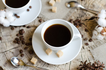 two cups coffee old wooden stump