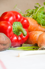 vegetables and mint on a white tablecloth
