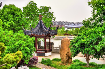 Garden near canal and city walls in Suzhou