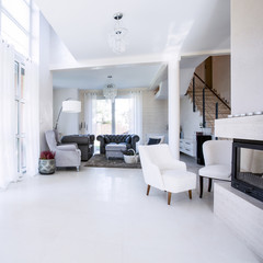 Modern living room with big garden windows