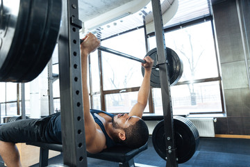 Man workout with barbell