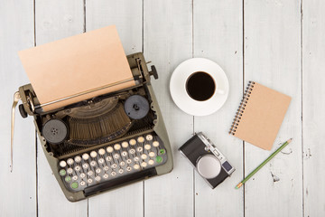 writer's workplace - wooden desk with typewriter