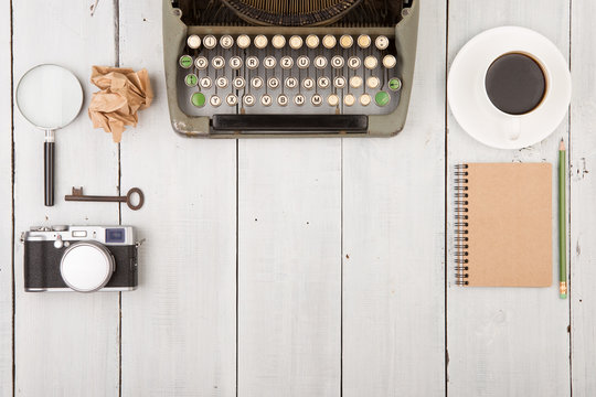 writer's workplace - wooden desk with typewriter
