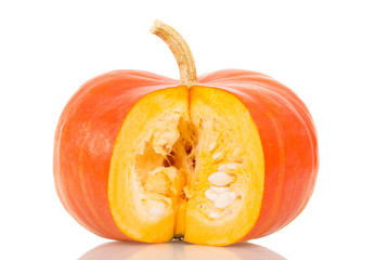 Ripe pumpkin with  carved piece isolated on white background.