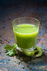 glass of juice of celery and greens, vertical