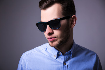 Fototapeta premium close up portrait of handsome man in sunglasses