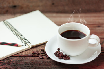 Coffee cup and note book