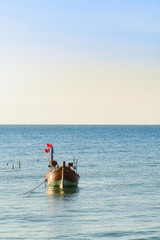 Small wooden fishing boat in Thailand