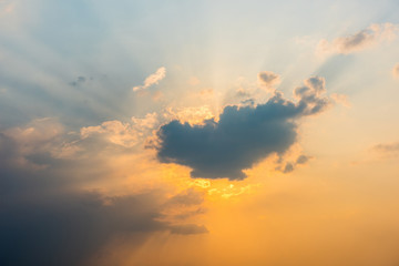 sun rays are striking through the clouds