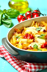Baked pasta bolognese.