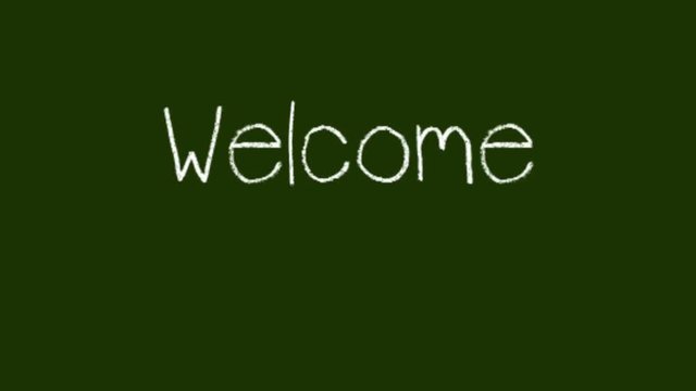 A moving chalk with a shadow writes on a green chalk board 'Welcome'