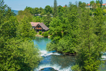 Fototapeta na wymiar Beautiful village of Rastoke near Slunj in Croatia, river Slunjcica, old water mills on waterfalls 