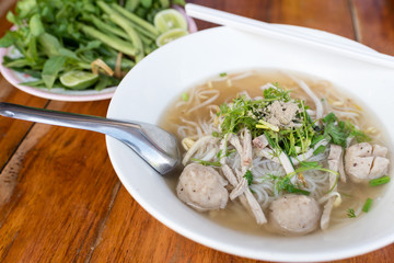 Vietnamese noodle (pho) on wooden table