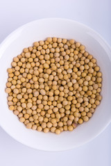 soybeans in whtie bowl on the white background