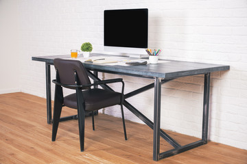 Designer desk with chair side