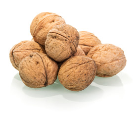 Much of whole walnuts isolated on white.