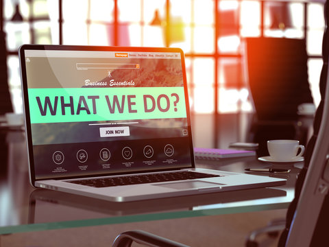 What We Do Concept. Closeup Landing Page on Laptop Screen  on background of Comfortable Working Place in Modern Office. Blurred, Toned Image. 3D Render.