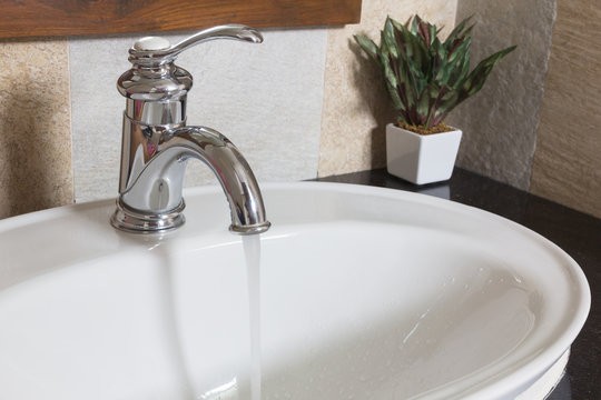 Water flow from luxury tap.