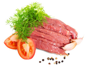 Raw beef, greens, tomatoes and spices isolated on white.