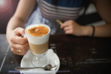 young woman drink coffee