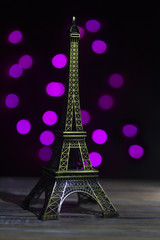 Eiffel tower shot in studio with bokeh lights in backgound
