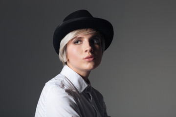 Woman in hat looking away