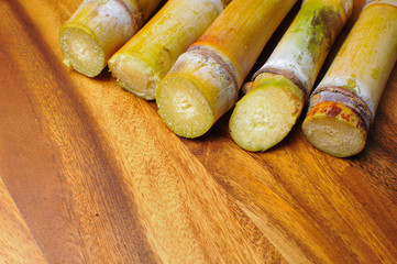 sugar cane on wood background