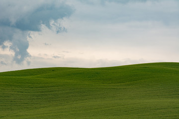 Tuscany hill in Val d'Orcia on a cloudy day