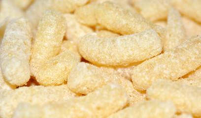 Yellow corn sticks close-up. Backgrounds and textures