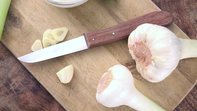 Portion of homemade Garlic Sauce as not loopable rotating 4K footage