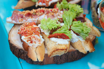 Sandwiches on wooden background