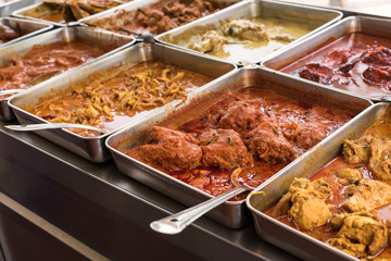 Various kinds of curries at Nasi Kandar restaurant in Georgetown, Penang, Malaysia