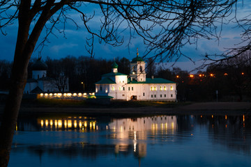 Main buildings of Mirozhsky monastery at night in Pskov, Pskovskaya oblast, Russia, 29 April 2016. View from the opposite embankment.