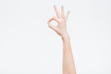 Female hand showing ok sign