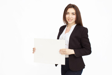 Naklejka premium happy woman holding white blank paper