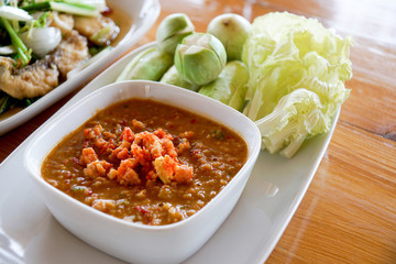 Spicy crab roe chili sauce served with vegetable (Thai food)