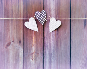 Three hearts on wooden background. Love message .. Postcard, Vin