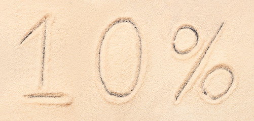 10 % lettering written on sand