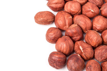 peeled hazelnuts isolated on white background macro