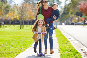 Mother daughter and son family in the park