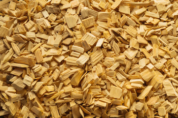 Wood chips texture, wooden background, top view.