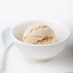 Ice cream with Earl grey tea flavor in white bowl