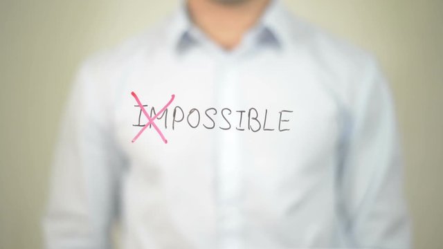 Possible,  Man writing on transparent screen