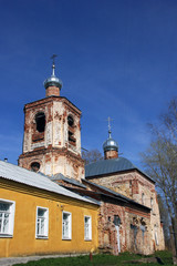 Fototapeta na wymiar Provincial old abandoned ruined russian orthodox church in the c