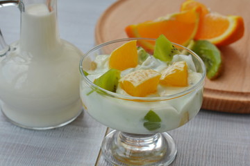 Fruit dessert with kiwi, orange and yogurt