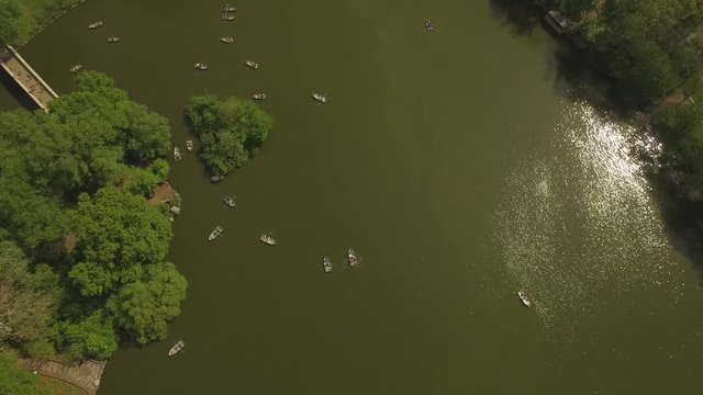 Flying above the lake at the Cental park in New york city. Aerial view of Central Park in New York City.Drone filming.