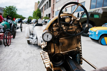 Iron handmade steering wheel at vintage sport car