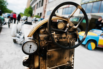Iron handmade steering wheel at vintage sport car