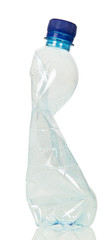 Blank crumpled plastic bottle isolated on white.