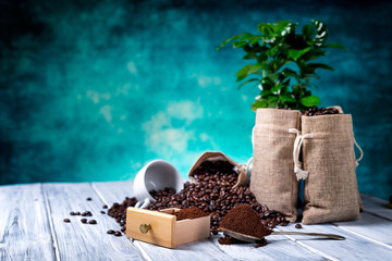 Ground coffee with coffe plants